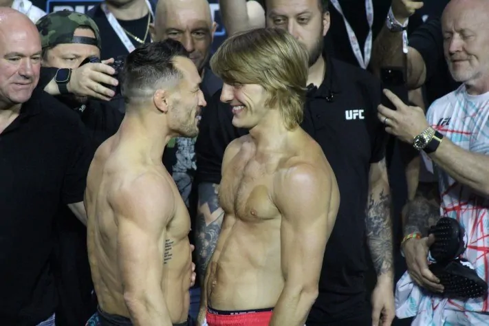 Michael Chandler faces off with Paddy Pimblett at the UFC 314 ceremonial weigh-ins in Miami