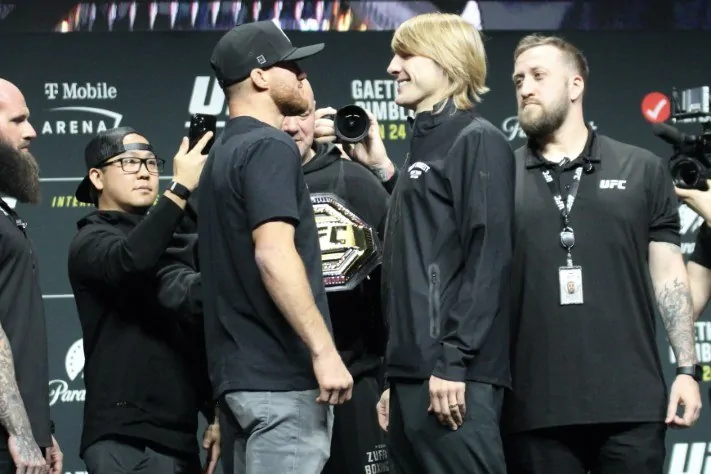 Justin Gaethje and Paddy Pimblett face off on stage at the UFC 324 press conference