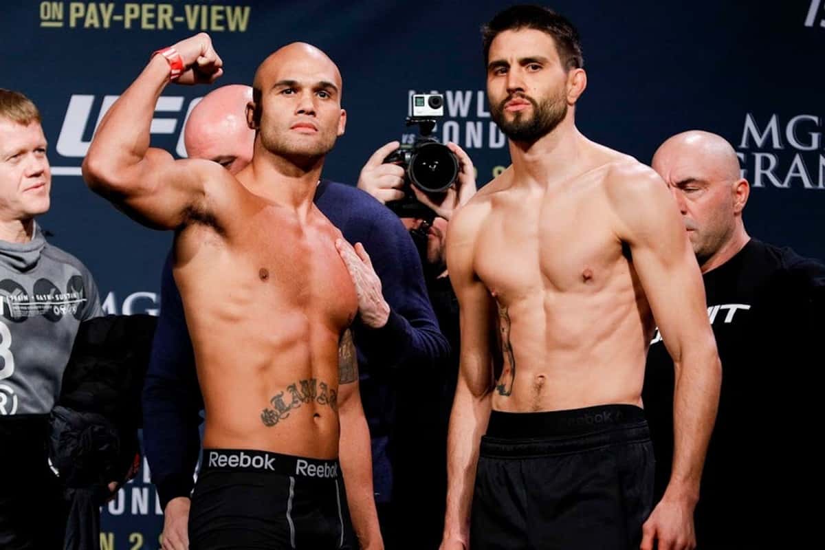 Robbie Lawler and Carlos Condit pose at the UFC 195 weigh-ins