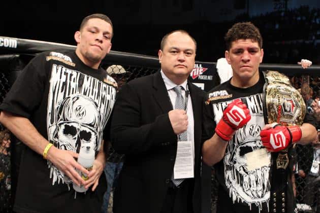 Nick Diaz with the Strikeforce welterweight belt alongside Nate Diaz and Scott Coker