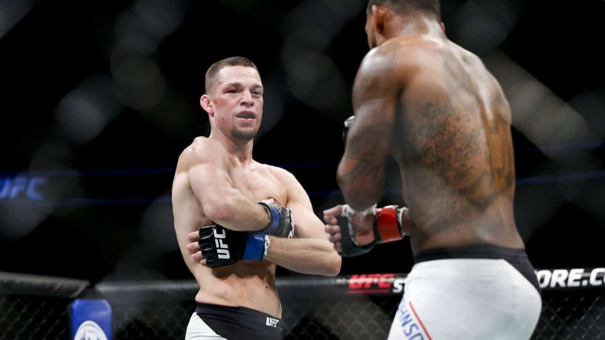 Nate Diaz in the Octagon against Michael Johnson