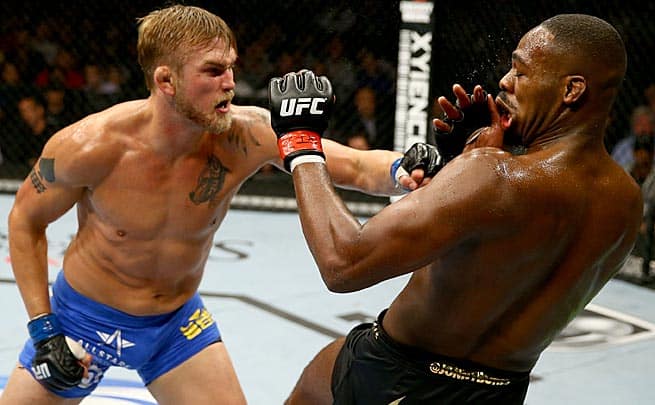 Alexander Gustafsson lands a punch on Jon Jones during their UFC 165 title fight