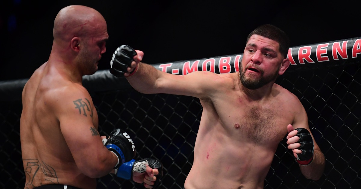 Nick Diaz throws a punch at Robbie Lawler at UFC 266 in Las Vegas