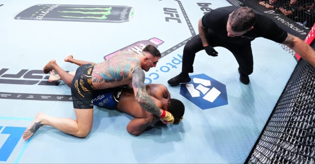 Tom Aspinall celebrates after knocking out Curtis Blaydes at UFC 304 in Manchester