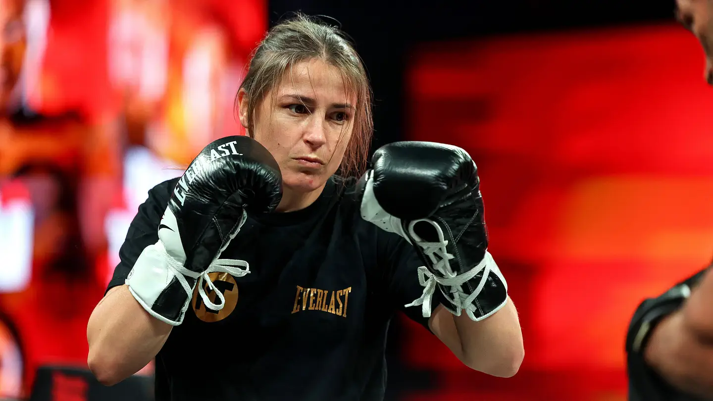 Katie Taylor celebrates at Croke Park after retiring as undisputed champion