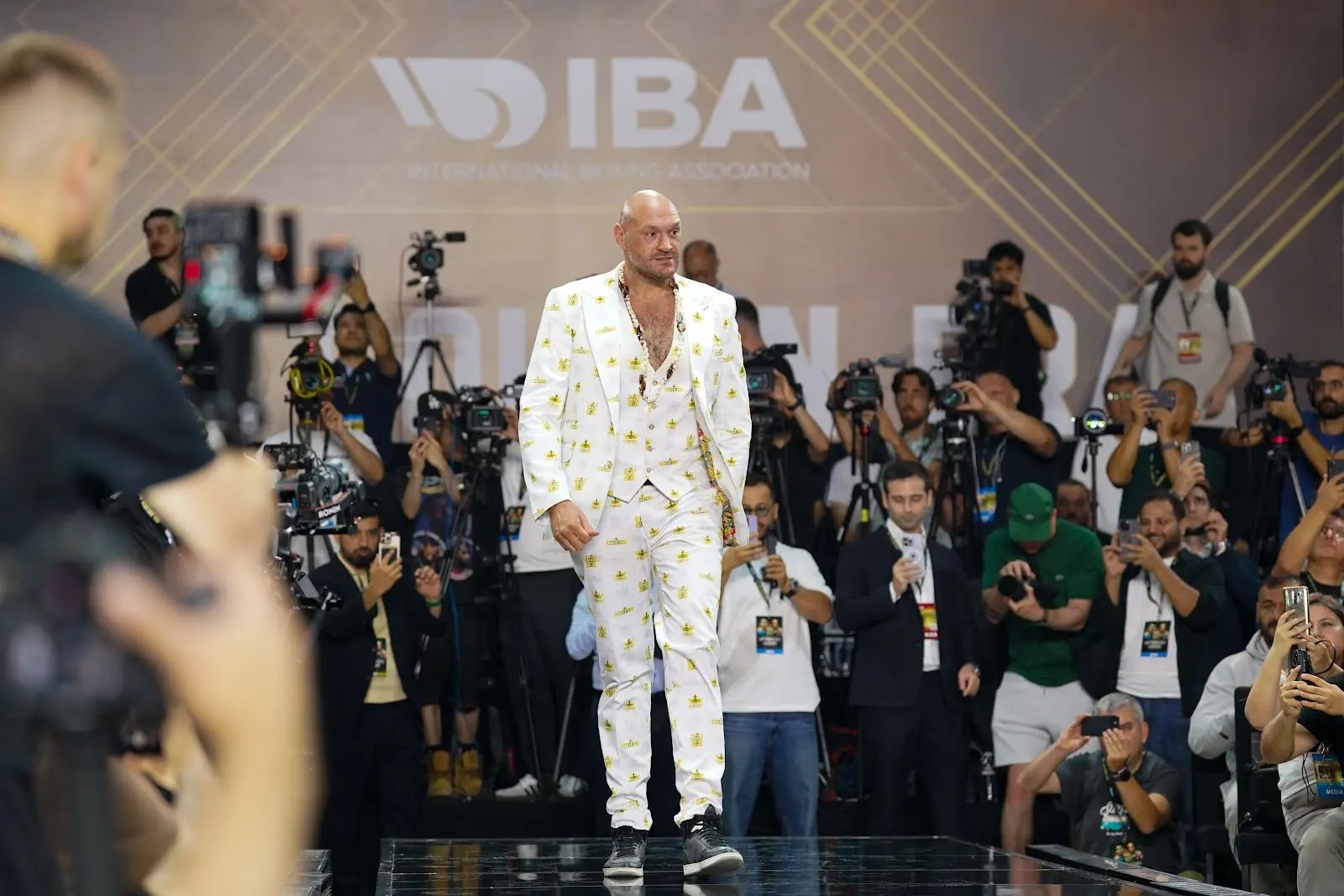Tyson Fury poses with a championship belt