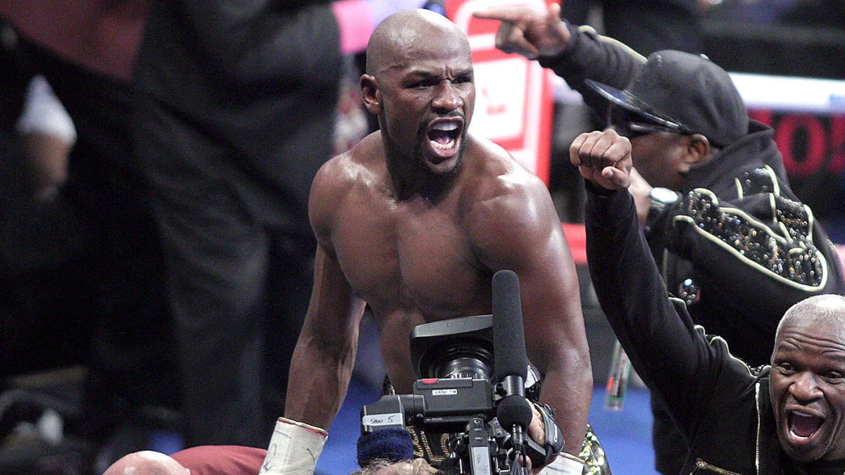 Floyd Mayweather celebrates after stopping Conor McGregor in Las Vegas