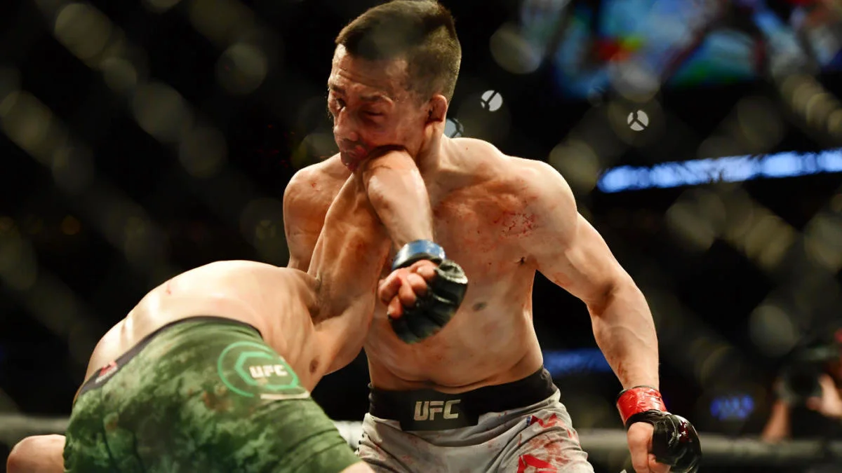 Yair Rodriguez lands his last second upward elbow on Chan Sung Jung at UFC Fight Night 139 in Denver