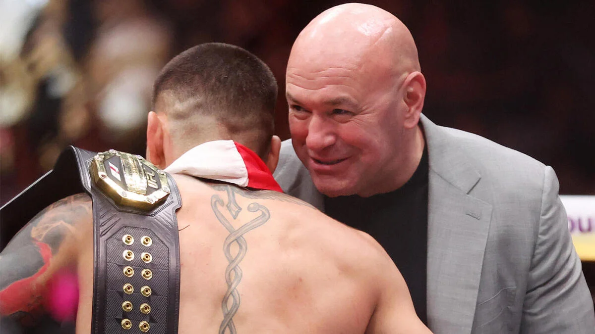 Dana White speaks at a UFC press conference with Ilia Topuria beside him