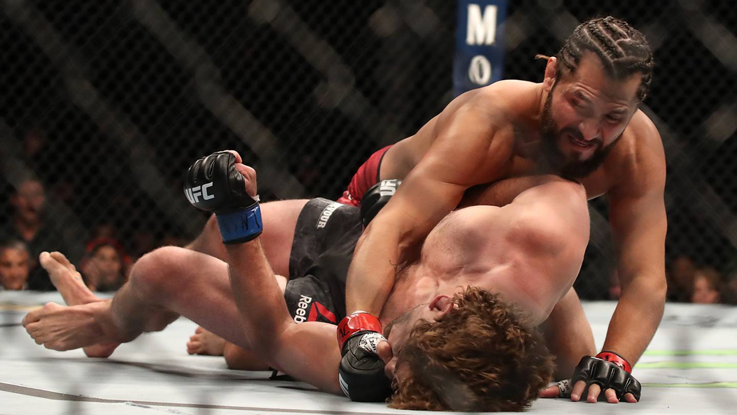Jorge Masvidal knocks out Ben Askren with a flying knee five seconds into their fight at UFC 239